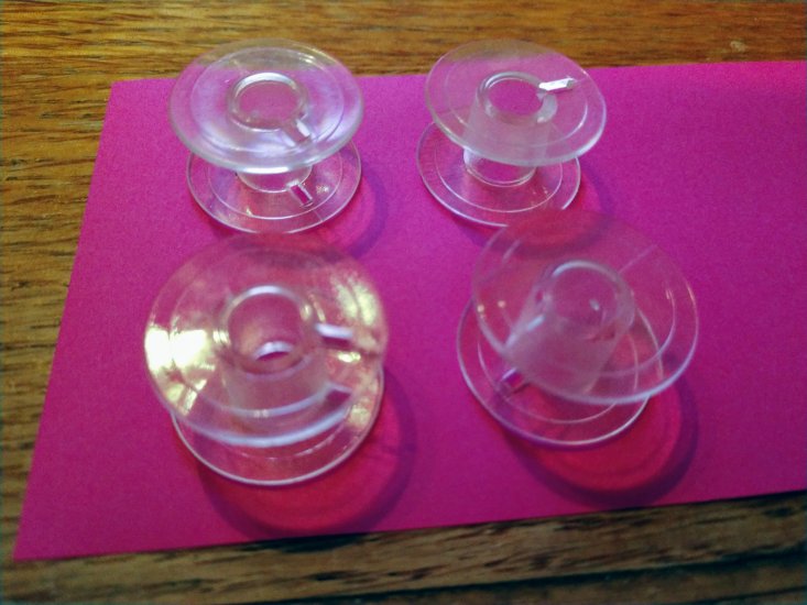 (image for) Bobbins, Clear, With Notch on Each Side, 4 Bobbins, Item B61 - Click Image to Close